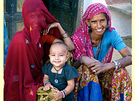 Two Rajasthani woman with child